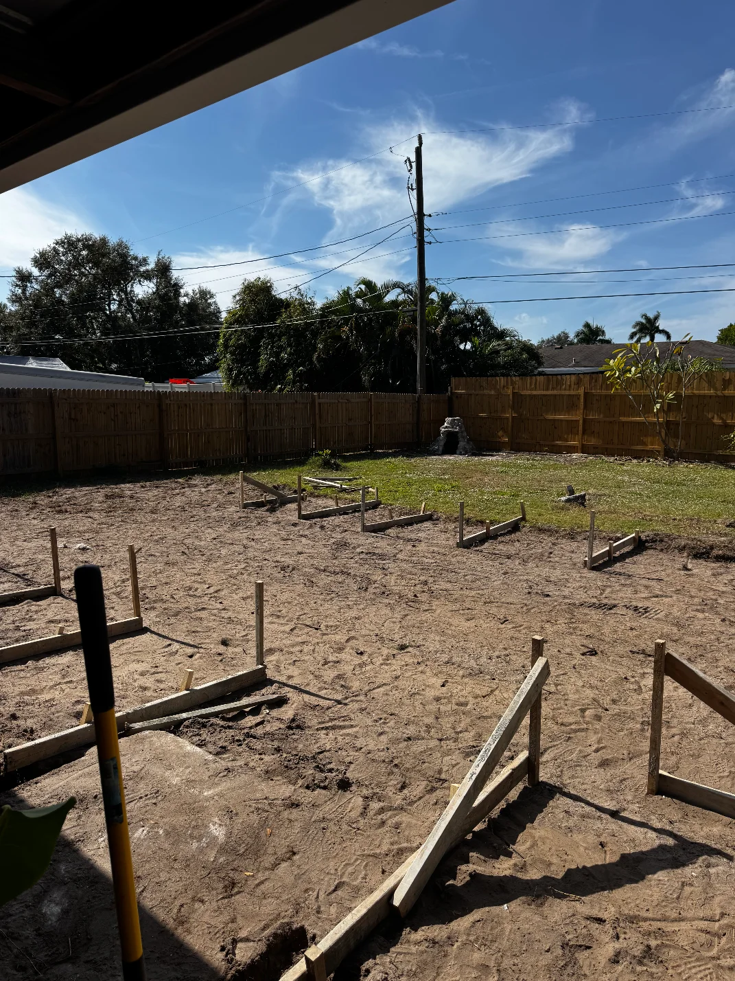 Grading Pool In Manatee County Backyard